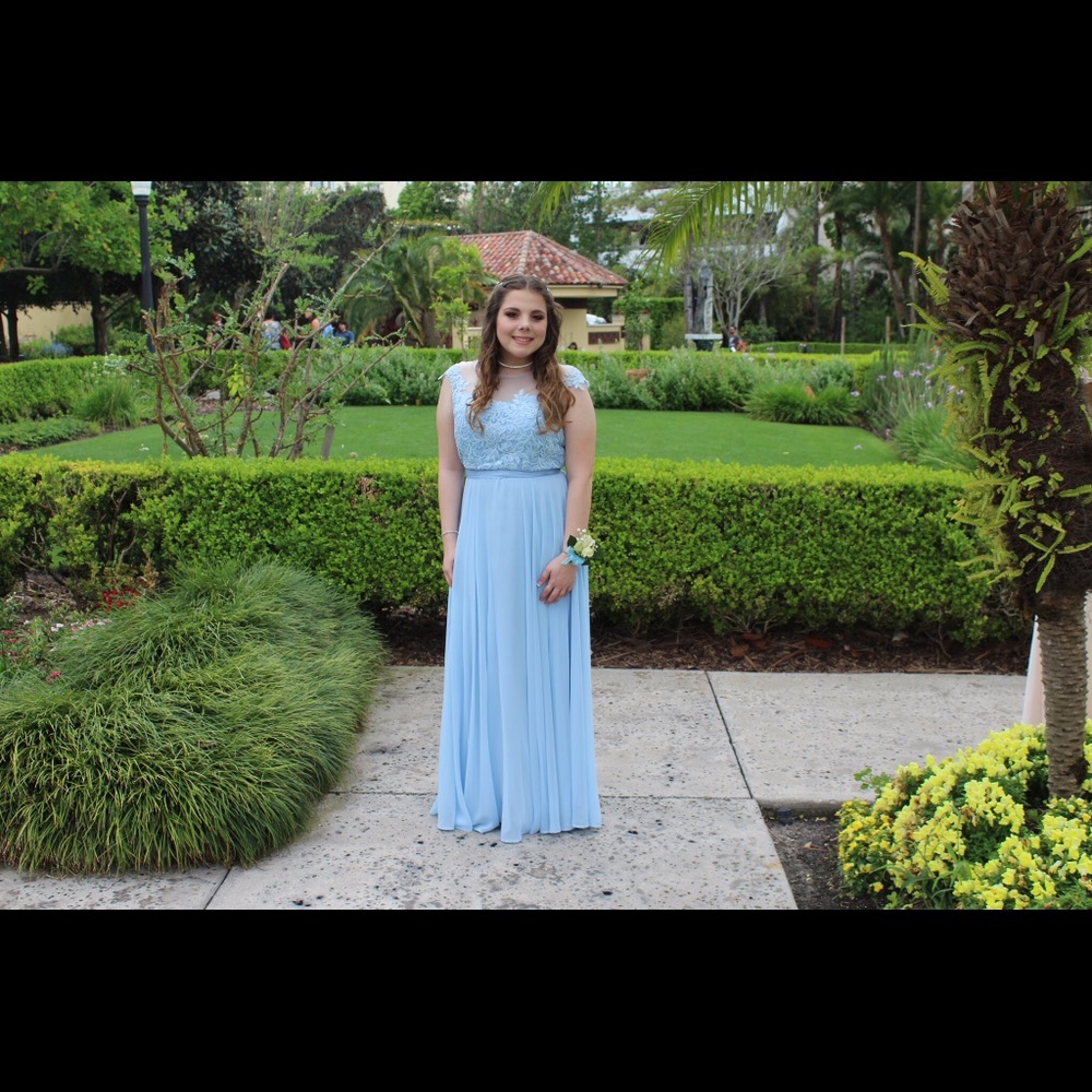 Size 12 blue gown. Only worn one time!